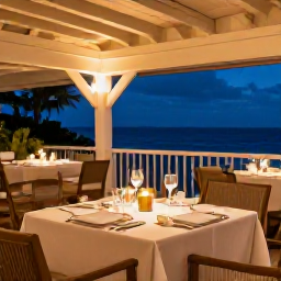 Caribbean Holidays, Barbados Luxury Holidays, Fine dining restaurant in Barbados serving elegant Caribbean cuisine, warm evening lighting and an intimate terrace