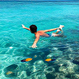 Caribbean Holidays, Barbados Solo Holidays, Solo traveller swimming with colourful tropical fish in clear Barbados water near a coral reef, sunny Caribbean setting