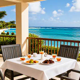 Caribbean Holidays, Barbados Spa Breaks, Outdoor Barbados hotel terrace overlooking the sea with a healthy lunch, herbal tea and comfortable seating
