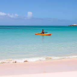 Caribbean Holidays, Bermuda Adventure Holidays, A kayaker paddling across clear turquoise water beside Bermuda's pink-sand coastline on a bright calm day