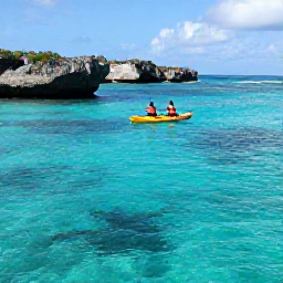 Caribbean Holidays, Bermuda Adventure, Kayakers paddling across clear turquoise water near Bermuda's rocky coastline, with colourful fish visible beneath the surface