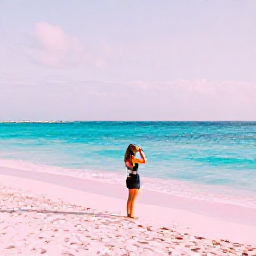 Caribbean Holidays, Bermuda Instagram Spots, A vivid pink-sand beach in Bermuda on a bright February morning, turquoise water, pastel sky and a traveller taking photographs
