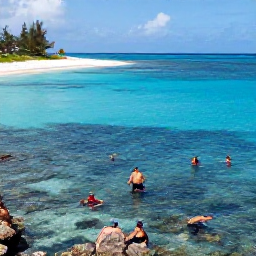 Caribbean Holidays, Bermuda November Holidays, Visitors snorkelling in clear blue Bermuda waters near a coral reef, with a quiet beach and November sunshine