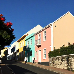 Caribbean Holidays, Bermuda Walking Holidays, Historic Bermuda town street with pastel buildings, stone walls and walkers exploring in gentle February sunshine