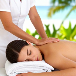 Caribbean Holidays, Bermuda Wellness, Traveller receiving a relaxing massage at a bright Bermuda spa, with natural textures and a calm tropical setting