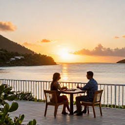 Caribbean Holidays, British Virgin Islands Honeymoons, A luxury honeymoon resort overlooking a calm Caribbean bay in the British Virgin Islands, with a couple enjoying a sunset terrace