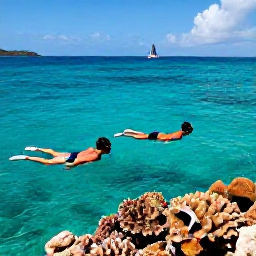 Caribbean Holidays, BVI Adults Only July, Couple snorkelling in crystal-clear Caribbean water near a coral reef in the British Virgin Islands, with colourful fish and a sailing boat in the distance