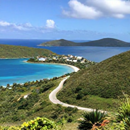 Caribbean Holidays, BVI February Tours, A scenic viewpoint over Tortola in the British Virgin Islands, showing green hills, a winding road, blue bays and distant islands