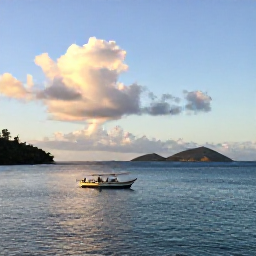 Caribbean Holidays, Caribbean Island Hopping, A scenic Caribbean island coastline at golden hour, showing Saint Kitts and Nevis with a traditional island boat and distant neighbouring islands