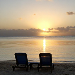 Caribbean Holidays, Caribbean Island Hopping, Sunset over a Caribbean beach with two lounge chairs, calm sea and warm golden light