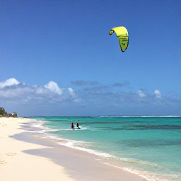 Caribbean Holidays, Caribbean Kitesurfing, Kitesurfer gliding across clear turquoise Caribbean water beside a wide sandy beach, bright tropical sky and steady trade winds