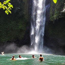 Caribbean Holidays, Caribbean Waterfalls, Travellers swimming in a clear natural pool beneath a Caribbean waterfall, with rainforest and sunlight filtering through leaves