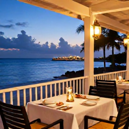 Caribbean Holidays, Cayman Adults Only, Elegant seaside restaurant in Grand Cayman at dusk, with a table for two, local seafood and soft lantern light