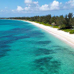 Caribbean Holidays, Cayman Adventure Holidays, Aerial coastal photograph of Grand Cayman, showing clear turquoise water, white sand beaches and lush tropical shoreline in bright May sunshine