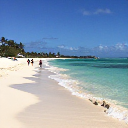 Caribbean Holidays, Cayman Beach Holidays, Seven Mile Beach in Grand Cayman on a sunny July morning, clear turquoise water, soft white sand and a few relaxed holidaymakers