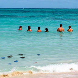 Caribbean Holidays, Cayman December Beaches, Visitors swimming and snorkelling in clear Caribbean water near a sandy Cayman Islands beach, colourful fish visible below