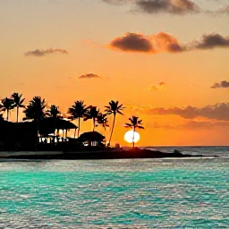 Caribbean Holidays, Cayman Instagram Spots, Sunset at Rum Point in Grand Cayman with calm turquoise water, palm silhouettes and warm orange April sky