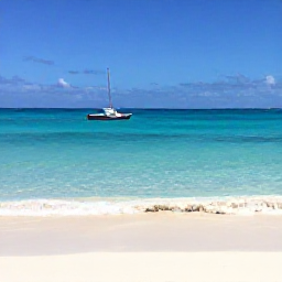 Caribbean Holidays, Cayman Islands Tours, Clear turquoise sea, white sand beach and a small boat near Grand Cayman in bright June sunshine