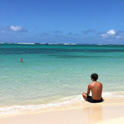 Caribbean Holidays, Cayman Nature Holidays, Travellers relaxing beside a clear Caribbean sea after a nature walk in the Cayman Islands