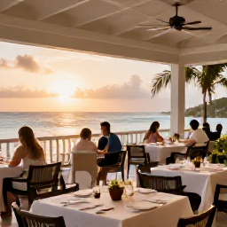 Caribbean Holidays, Cayman Spa Breaks, Elegant beachfront restaurant on Grand Cayman at sunset with healthy Caribbean dishes and relaxed diners