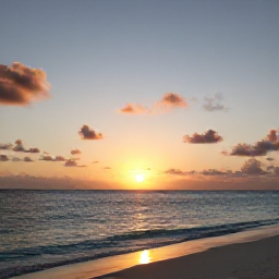 Caribbean Holidays, Cayman Wellness, Peaceful sunset over the Caribbean Sea from a quiet Cayman Islands shoreline, soft clouds and warm evening light