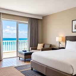 Caribbean Holidays, Cheap April Holidays, A comfortable budget-friendly Caribbean hotel room near the beach on Saint Kitts, with bright natural light and simple furnishings