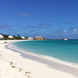 Caribbean Holidays, Cheap August Aruba, Sunny Eagle Beach in Aruba with turquoise water, white sand and a few relaxed holidaymakers in August