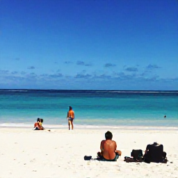 Caribbean Holidays, Cheap Bahamas Holidays, Travellers relaxing on a quiet white-sand beach in The Bahamas during April, with calm turquoise sea