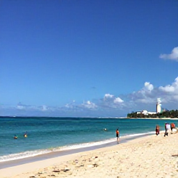 Caribbean Holidays, Cheap Barbados February, Sunny Barbados beach in February with calm turquoise water, golden sand and a few relaxed holidaymakers