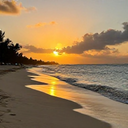 Caribbean Holidays, Cheap Barbados June, Barbados coastline at sunset with golden light, a quiet sandy beach and small waves along the shore