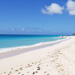 Caribbean Holidays, Cheap Caribbean Holidays, Relaxed Caribbean beach with turquoise water, soft white sand and a few colourful umbrellas, realistic travel photograph