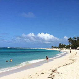 Caribbean Holidays, Cheap Cayman February, Sunny Seven Mile Beach in Grand Cayman with calm turquoise water, white sand and a few relaxed holidaymakers