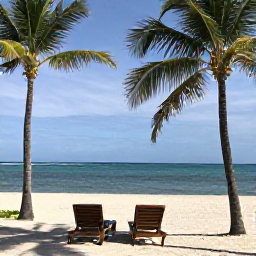 Caribbean Holidays, Cheap Cuba December, Relaxed Cuban beach resort with palm-fringed sandy beach, sun loungers and calm blue sea
