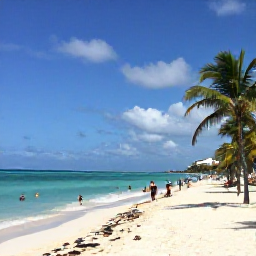 Caribbean Holidays, Cheap Cuba February, Sunny Varadero beach in Cuba in February, with turquoise water, white sand, palm trees and relaxed holidaymakers