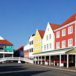 Caribbean Holidays, Cheap Cura&ccedil;ao October, Willemstad street scene in Cura&ccedil;ao with colourful historic buildings, a pedestrian bridge and local caf&eacute;s