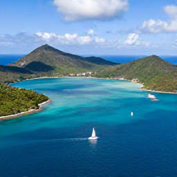 Caribbean Holidays, Cheap December Holidays, Aerial view of the British Virgin Islands with turquoise water, green hills and sailing boats in December sunshine
