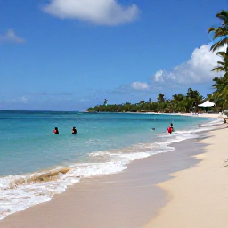 Caribbean Holidays, Cheap December Martinique, Anse Dufour beach in Martinique with clear blue water, golden sand and snorkellers near the shore