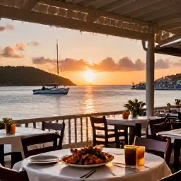 Caribbean Holidays, Cheap February Holidays, Friendly waterfront restaurant in the British Virgin Islands at sunset, with fresh seafood, simple tables and boats in the harbour
