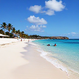 Caribbean Holidays, Cheap February Holidays, Quiet sandy beach in Cura&ccedil;ao with snorkellers in clear shallow water and palm trees beside the shore