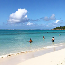 Caribbean Holidays, Cheap Guadeloupe October, Visitors swimming in clear Caribbean water beside a sandy Guadeloupe beach in warm October sunshine