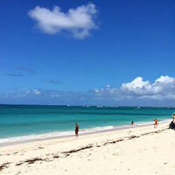 Caribbean Holidays, Cheap January Bahamas, Sunny Nassau beach in January with turquoise water, white sand and a few relaxed holidaymakers