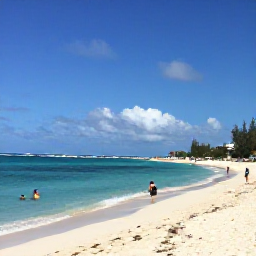Caribbean Holidays, Cheap January Cayman, Sunny Seven Mile Beach in Grand Cayman during January, with calm turquoise water, white sand and a few relaxed holidaymakers