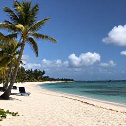 Caribbean Holidays, Cheap January Holidays, Quiet white-sand beach on Tortola with calm turquoise sea, palm trees and a small number of visitors