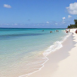 Caribbean Holidays, Cheap June Cayman, Travellers enjoying the shallow clear water and white sand at Seven Mile Beach, Grand Cayman, during a bright June day