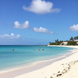 Caribbean Holidays, Cheap May Holidays, Sunny Palm Beach in Aruba with calm turquoise water, white sand and a few relaxed holidaymakers in May