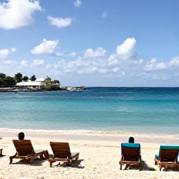 Caribbean Holidays, Cheap November Holidays, Antigua beach with calm turquoise sea, sun loungers and a few visitors enjoying a relaxed November holiday