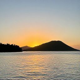 Caribbean Holidays, Cheap September Dominica, A peaceful Dominica sunset over the Caribbean Sea, with a quiet waterfront and green hills fading into the distance