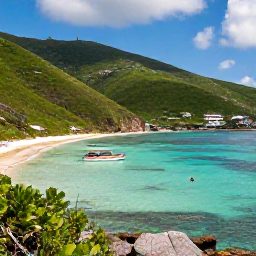 Caribbean Holidays, Cheap September Holidays, Small boat exploring a sheltered Caribbean cove near Saint Martin, with green hills, clear water and snorkellers