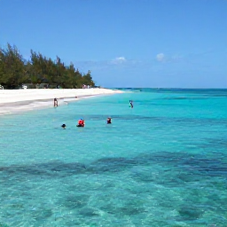 Caribbean Holidays, Cheap Turks Caicos, Visitors swimming and snorkelling in clear turquoise water beside a peaceful Turks and Caicos beach