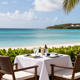 Caribbean Holidays, Couples Holidays, Elegant beachfront restaurant table for two with Caribbean food and ocean views in the Grenadines